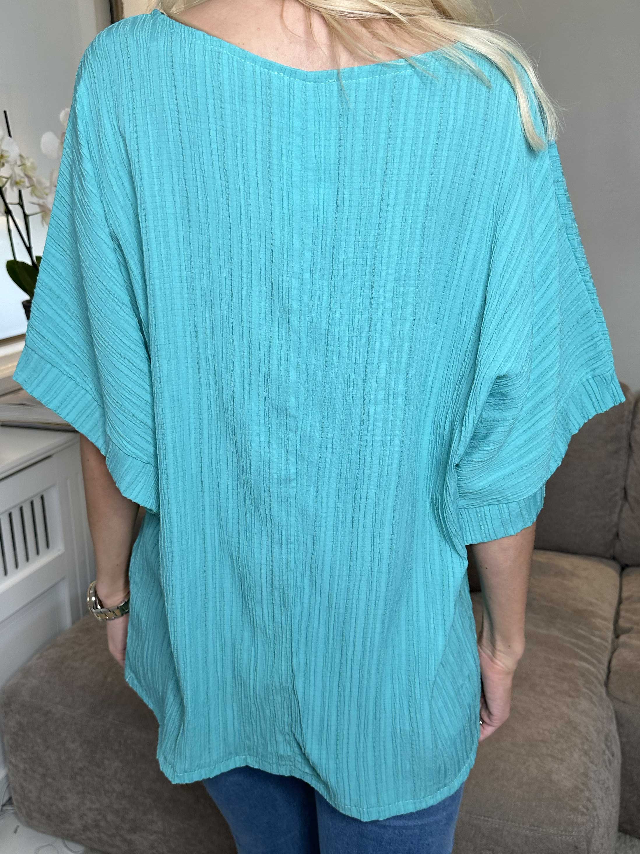 Cindy - Enfärgad blus i crepe-look